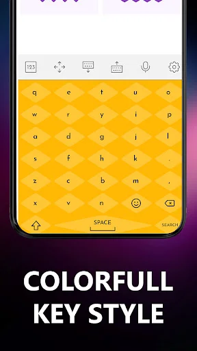Colorful yellow and orange keyboard theme featuring large rounded square keys with complete alphabet layout and spacious design