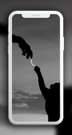 Minimalist black aesthetic wallpaper showing two silhouetted hands reaching toward crescent moon elegantly