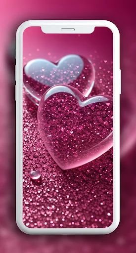 Pink glitter wallpaper with transparent heart-shaped designs on mobile phone