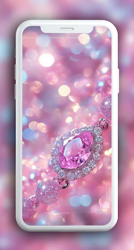 Pink sparkly wallpaper with bokeh effect and crystal gem design on mobile phone